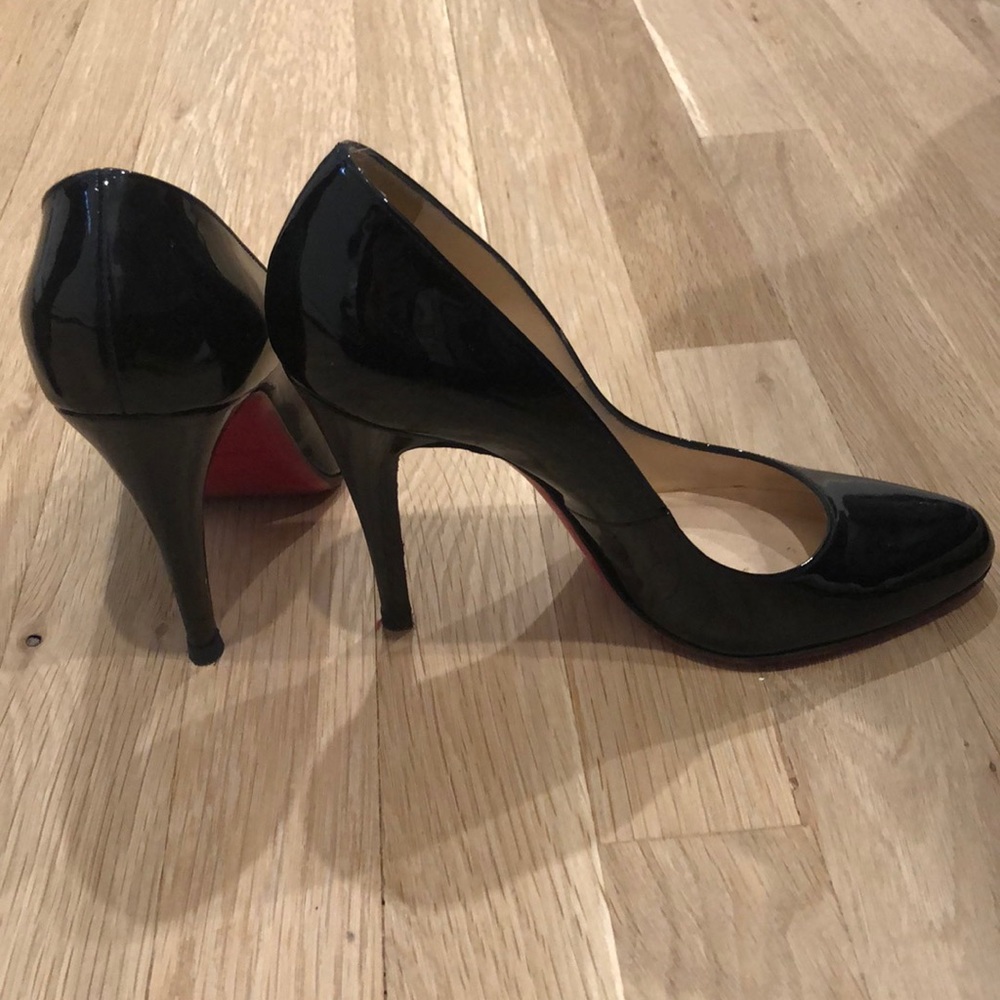 Christian Louboutin black patent leather pumps